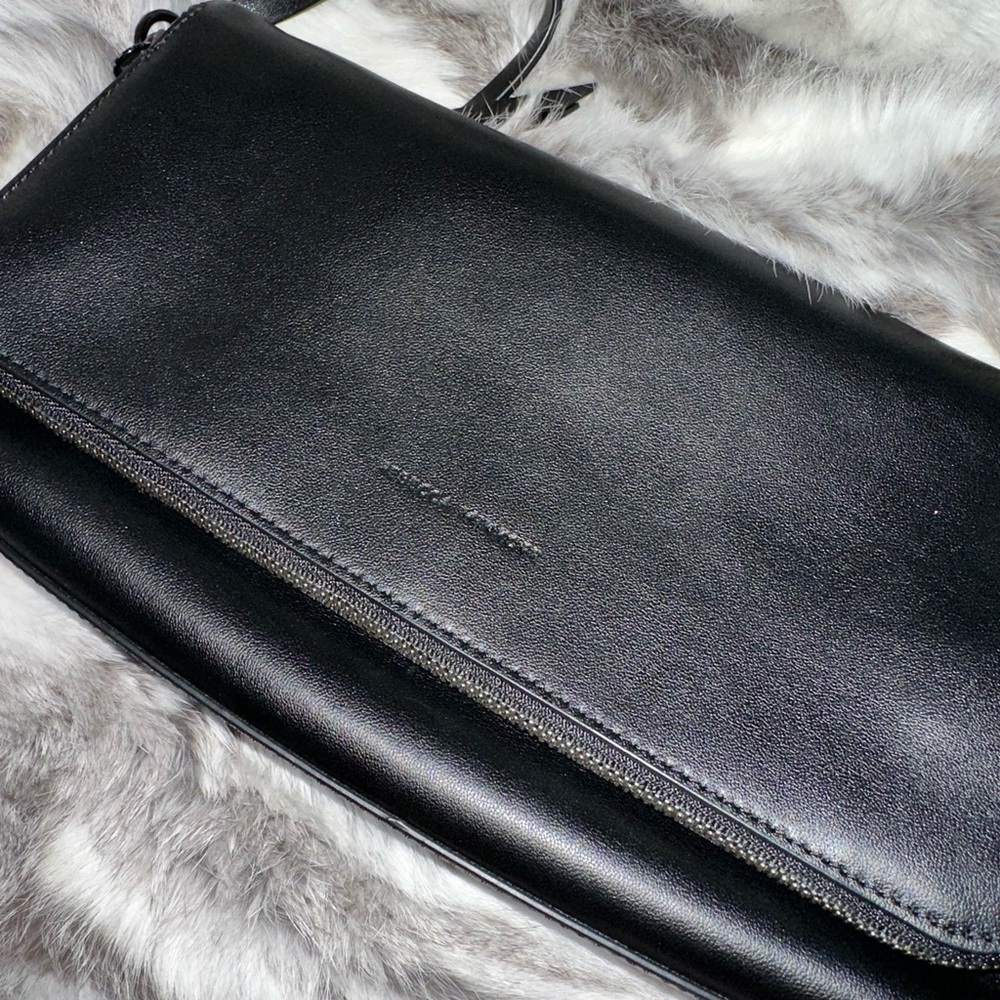 Rebecca Minkofff black handbag. Crossbody section fold over.Beautiful♥️